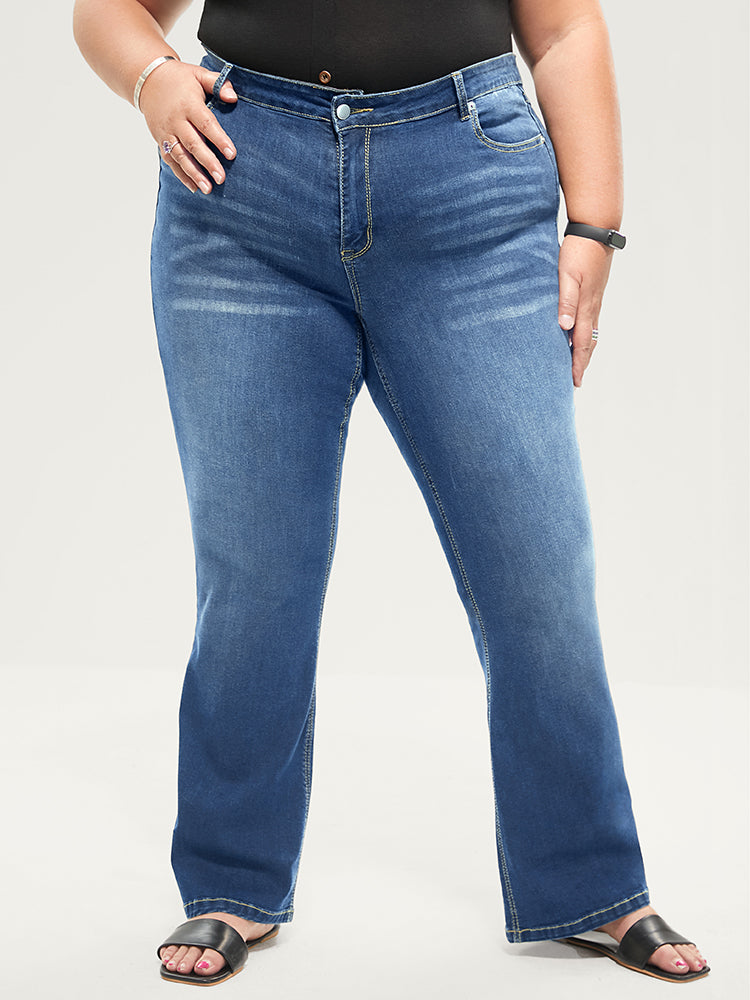 Jean bootcut à taille sculptante, très extensible, taille mi-haute, délavage moyen