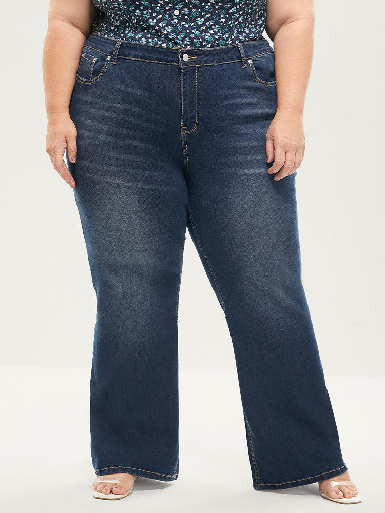 Jean bootcut à taille sculptante, très extensible, taille mi-haute, délavage moyen