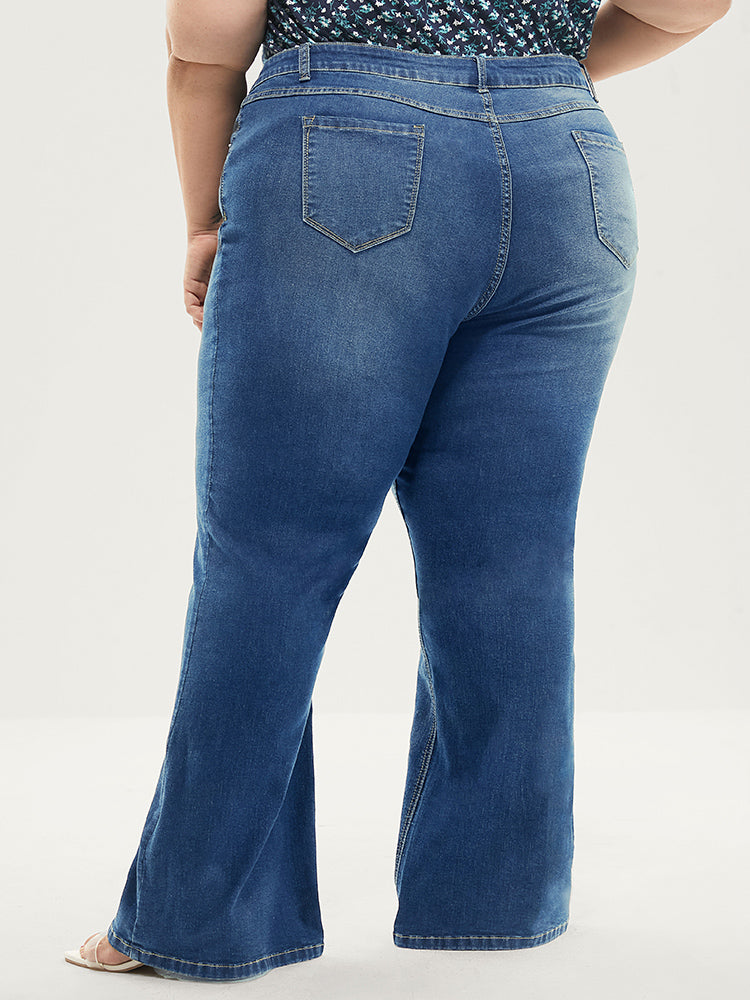 Jean bootcut à taille sculptante, très extensible, taille mi-haute, délavage moyen