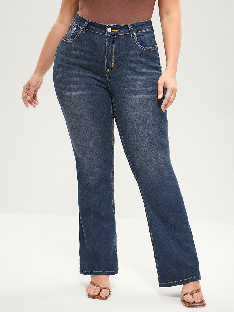 Jean bootcut à taille sculptante, très extensible, taille mi-haute, délavage moyen
