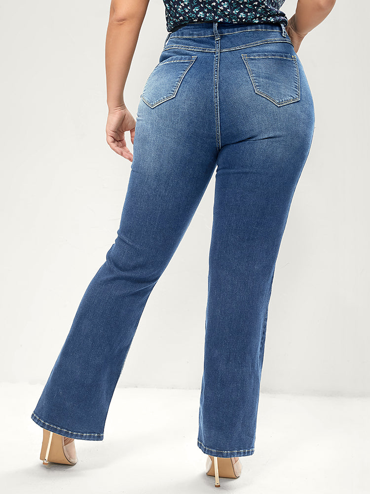 Jean bootcut à taille sculptante, très extensible, taille mi-haute, délavage moyen