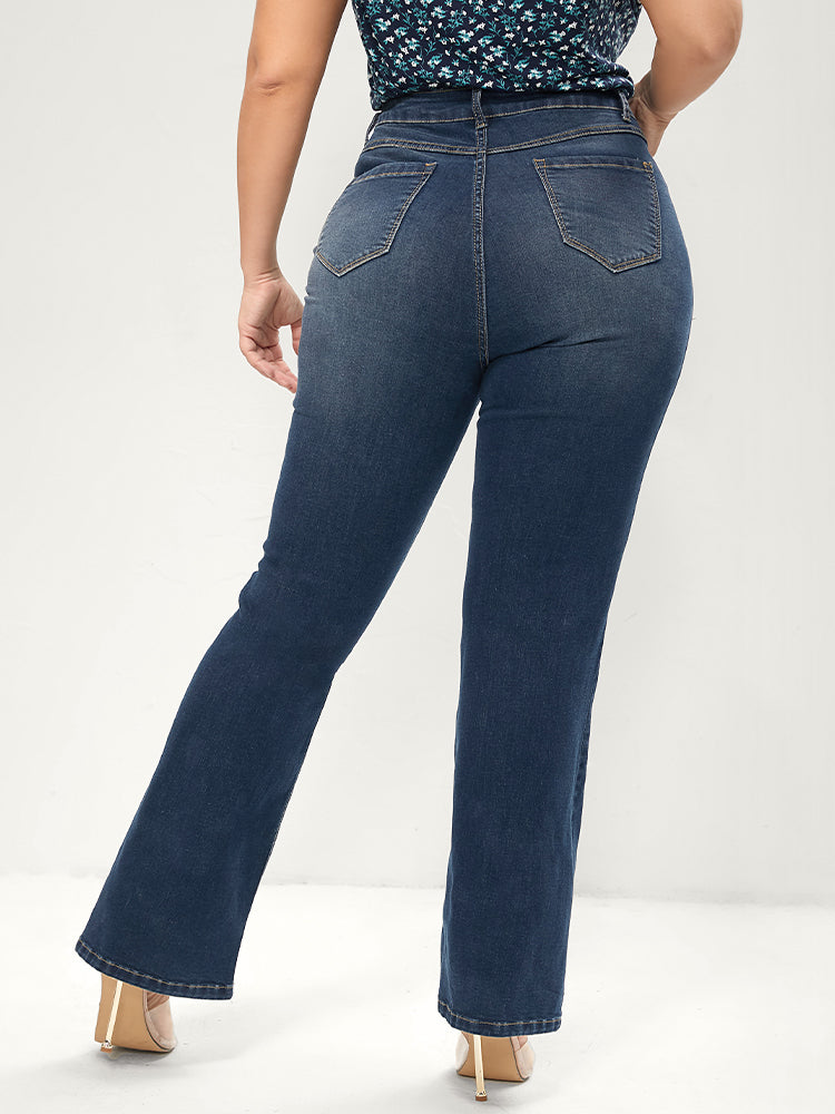 Jean bootcut à taille sculptante, très extensible, taille mi-haute, délavage moyen