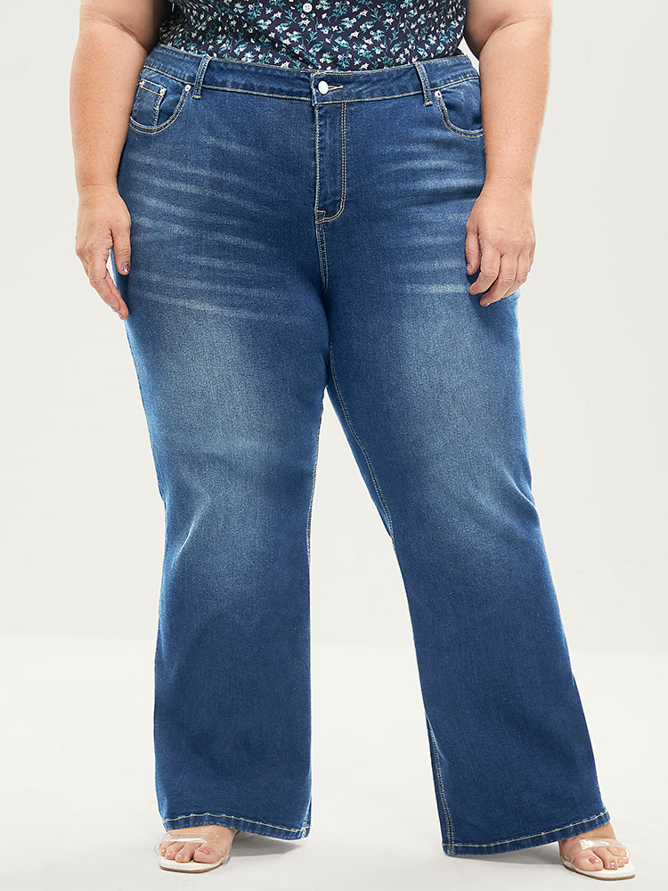 Jean bootcut à taille sculptante, très extensible, taille mi-haute, délavage moyen