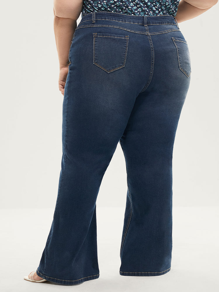 Jean bootcut à taille sculptante, très extensible, taille mi-haute, délavage moyen